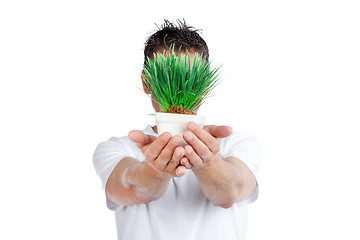 Image showing Man Holding Potted Plant