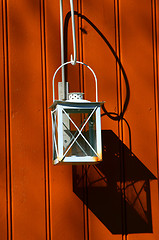 Image showing Lantern on wall in sunshine