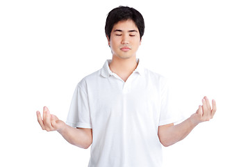 Image showing Young Asian Man Meditating