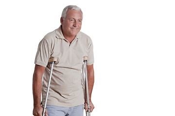 Image showing Senior Man with Crutches