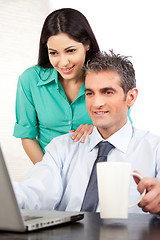 Image showing Businessman And Businesswoman At Work