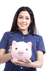 Image showing Smiling Woman Holding Piggy Bank