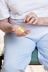 Image showing Sick Woman taking her Pills