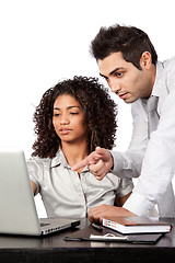 Image showing Businessman and Businesswoman Using Laptop