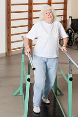 Image showing Tired Senior Woman On Walking Track