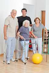 Image showing Portrait Of Disabled Senior People With Trainer