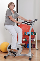 Image showing Female Doing Physical Exercise