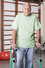 Image showing Senior Man having ambulatory therapy