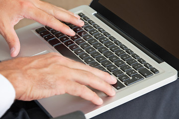 Image showing Hands Typing On Keyboard