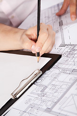 Image showing Architects Hand on Clipboard