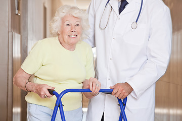 Image showing Doctor and Woman with Zimmerframe