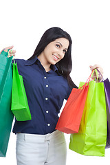 Image showing Happy Woman Holding Shopping Bags