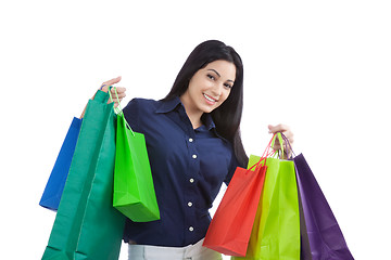 Image showing Happy Woman Holding Shopping Bags