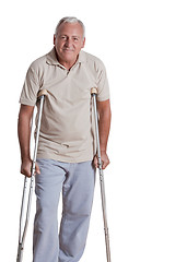 Image showing Senior Man with Crutches