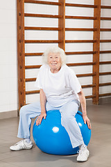 Image showing Happy Senior Woman Sitting On Fitness Ball