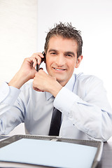 Image showing Businessman Talking On Cell Phone