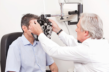 Image showing Optometrist Doing Sight Testing