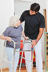 Image showing Woman And Trainer Looking At Each Other