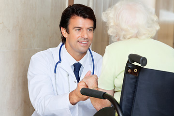 Image showing Doctor With Senior Woman In Wheel Chair