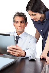 Image showing Businessman And Businesswoman At Work