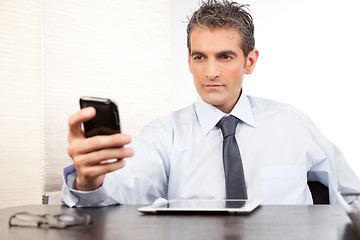 Image showing Businessman Using Cell Phone