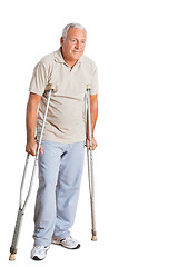 Image showing Senior Man On Crutches Looking Away