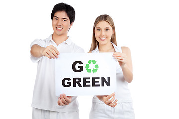 Image showing Young Couple  Holding Blank Placard