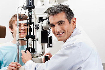 Image showing Optometrist Doing Visual Field Test On His Patient