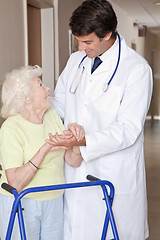 Image showing Doctor and Woman with Zimmerframe