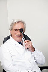 Image showing Optometrist With Ophthalmoscope