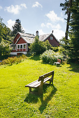 Image showing Lonely bench in backyard