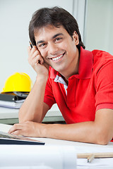 Image showing Happy Architect Sitting By Desk