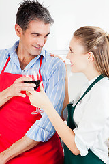 Image showing Happy Couple Cooking in Kitchen