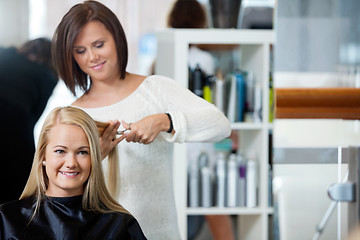 Image showing Woman Getting Haircut At Parlor