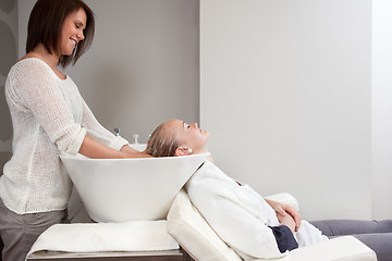 Image showing Young Woman Having Hair Wash in Beauty Salon