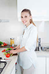 Image showing Woman Slicing Vegetables