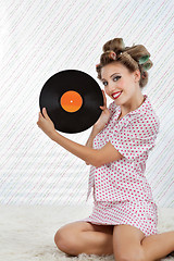 Image showing Beautiful Woman Holding Vinyl Record