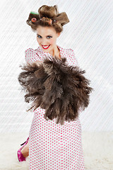 Image showing Pretty Woman With Ostrich Feather Duster