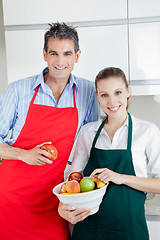 Image showing Happy Couple in Kitchen with Fruit