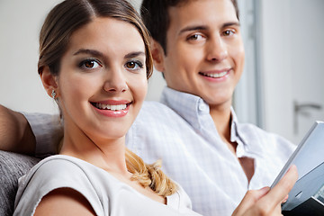 Image showing Young Woman Holding Tablet PC