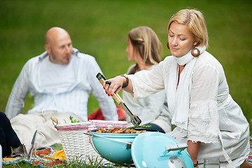 Image showing Friends BBQ Picnic in Park