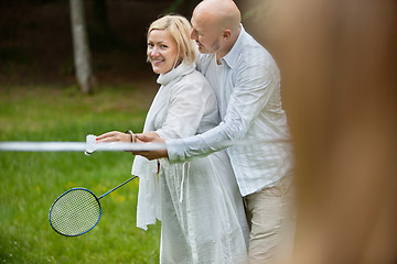 Image showing Couple Playing Badminton Together