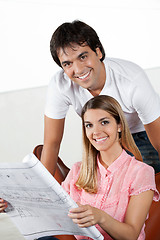 Image showing Couple With Blueprint