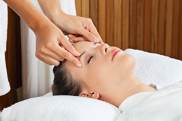 Image showing Female Receiving Head Massage At Spa