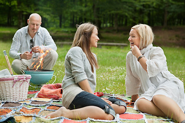 Image showing Happy Friends On An Outdoor Picnic