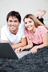 Image showing Young Couple Using Laptop