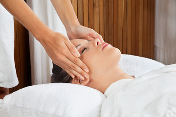 Image showing Woman Receiving Head Massage At Spa