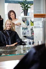 Image showing Hairdresser Giving Haircut To Woman