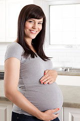 Image showing Beautiful Pregnant Woman Holding Belly