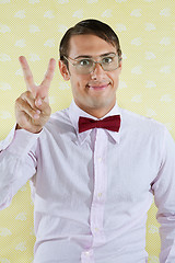 Image showing Geek Gesturing Peace Sign